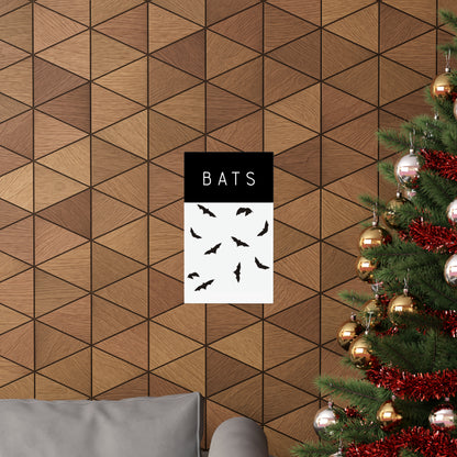 Bats poster on a wooden wall beside a Christmas tree