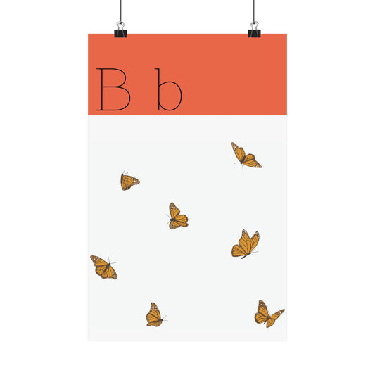 Butterflies Poster in white background with clips holding the poster up