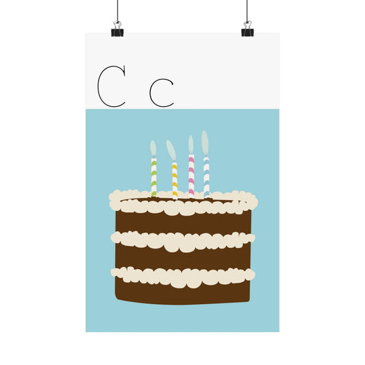 Cake Poster in white background with clips holding the poster up