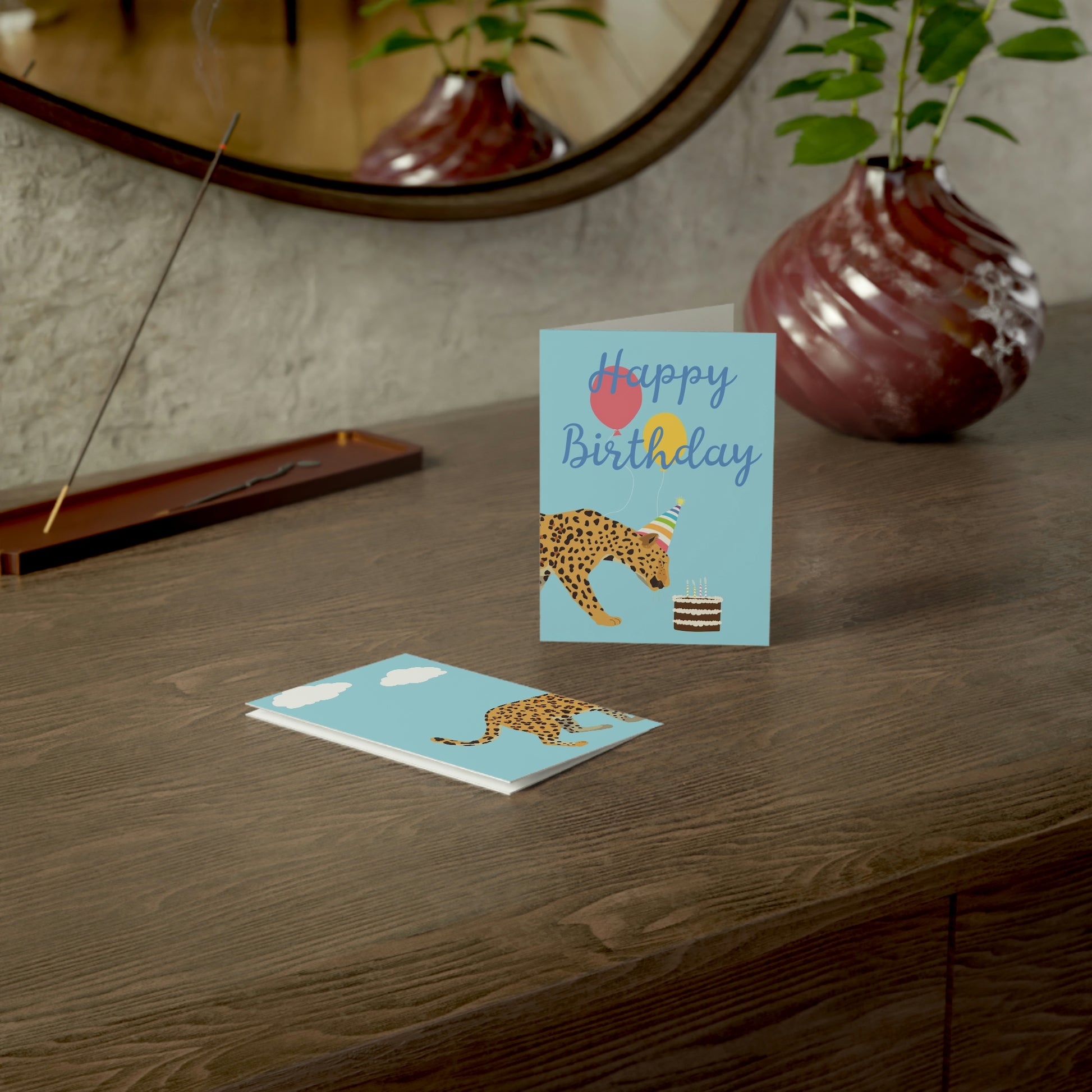 Forward Facing View of Leopard Birthday Card on Dark Table