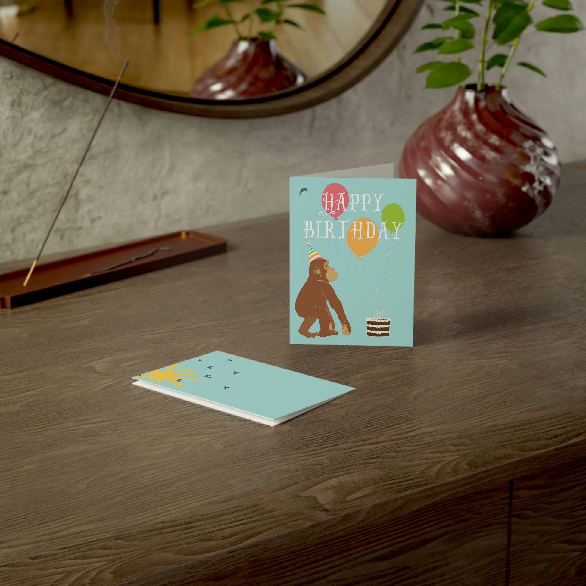 Forward Facing View of Monkey Birthday Card on Dark Table